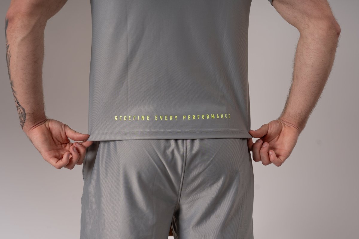 men's grey gym t-shirt, grey workout shirt for men, men's athletic grey t-shirt, grey fitness t-shirt men, moisture-wicking gym shirt, breathable workout shirt men, slim fit grey gym tee, men's performance t-shirt grey, quick-dry gym t-shirt men, lightweight workout shirt men, durable gym t-shirt grey, men's training t-shirt grey, grey activewear t-shirt men